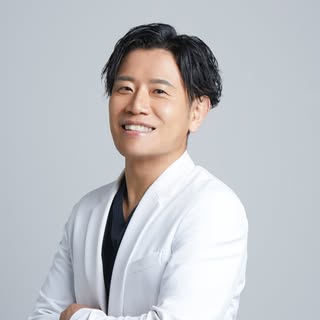 佐野 常男